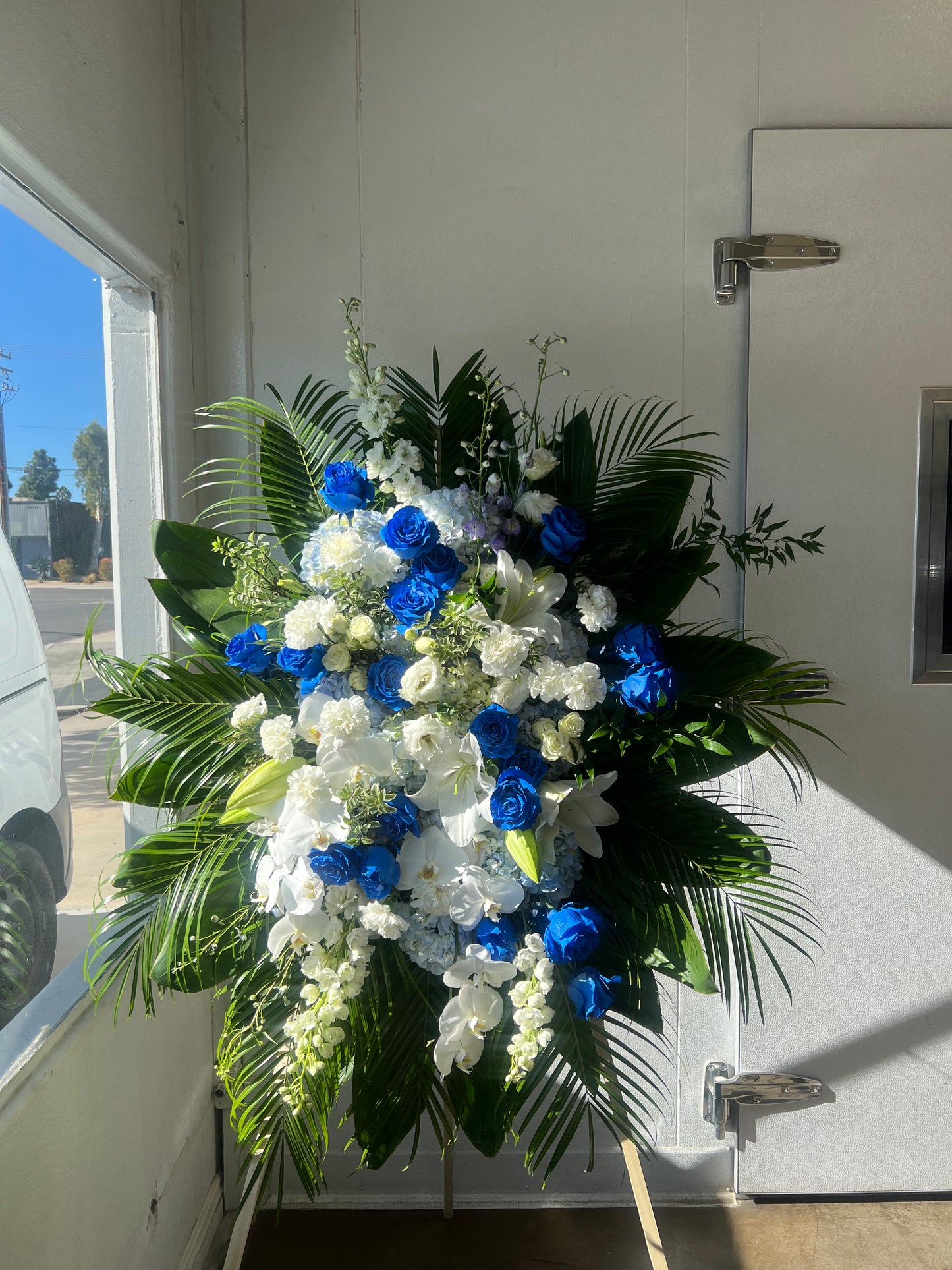 Blue and White Funeral Spray