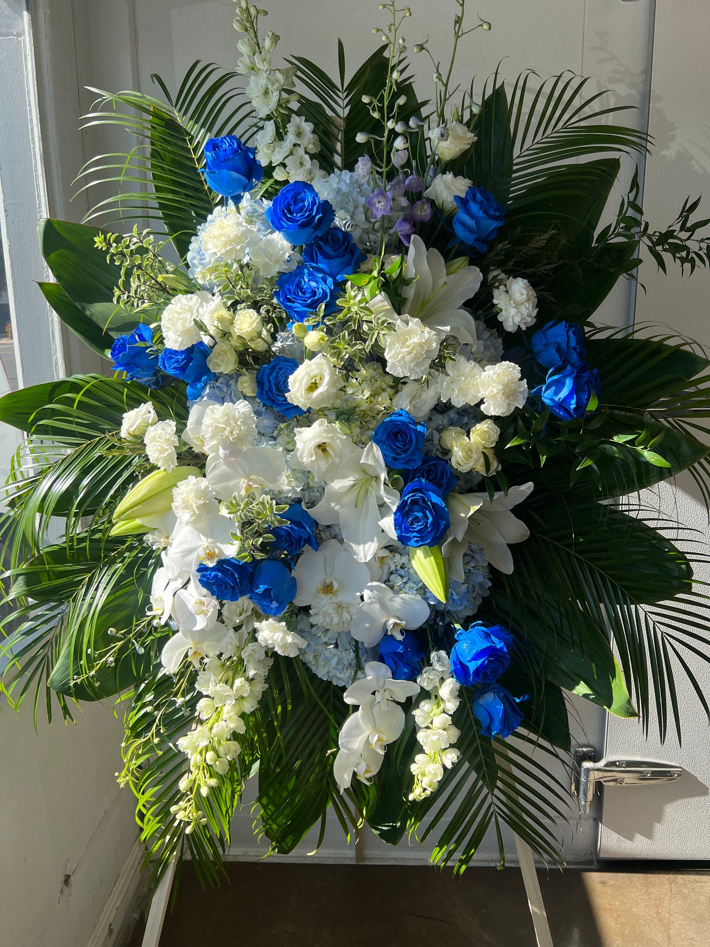 Blue and White Funeral Spray